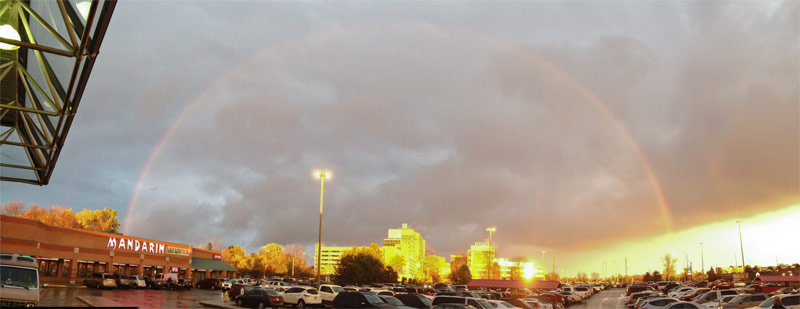 Rainbow over city scape of London Ontario Canada